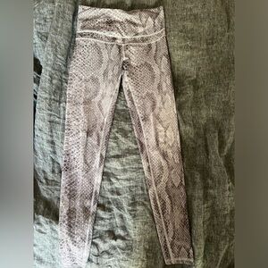Super cool gray snake skin print leggings.Size small from Varley.